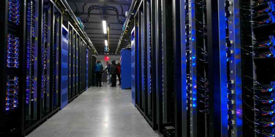 Data center as viewed from inside between server racks